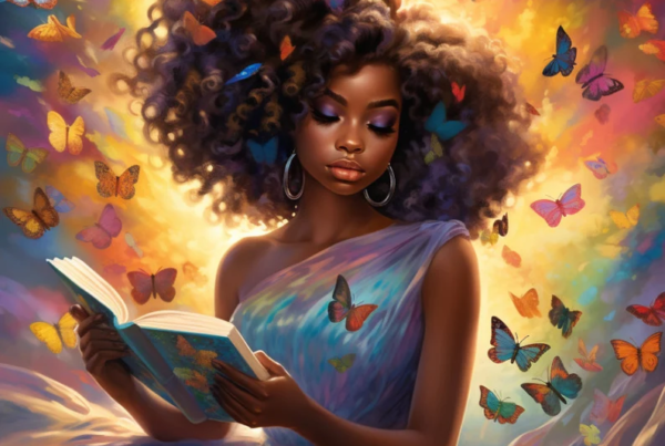 Image: Deep-toned skinned woman, holding a blue open book. Rainbow-coloured butterflies fly out of the pages and encircle her. The woman is glancing down at a monarch-looking butterfly. She has butterflies in her thick, voluminous ringlets. She is surrounded by a warm glow and a diffused rainbow-coloured background. She is wearing an asymmetrical, tuille-looking dress.